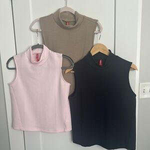 3 for the price of one. Spanx Sleeveless Mock Neck Tops - Pink, Navy, Tan